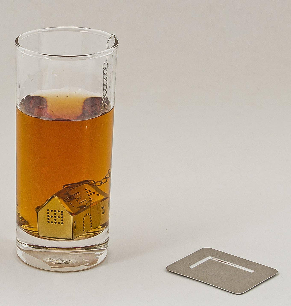 Silver House Tea Infuser: Steep with Style & Elegance